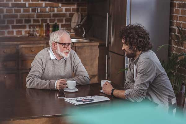 coffee-men-1 Sober Living Homes - Two men talking over coffee